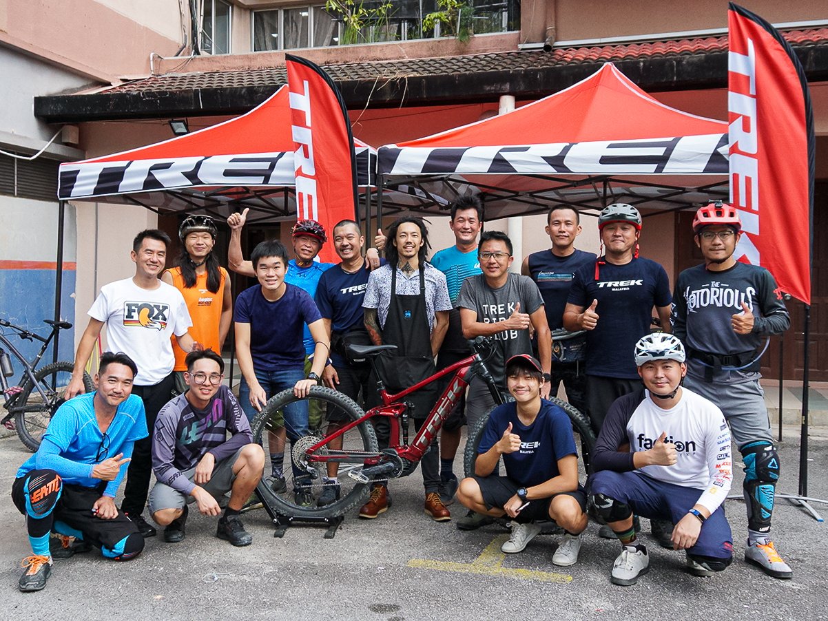 Mechanic tuning a mountain bike drivetrain